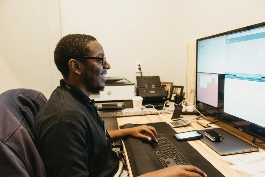 Photo: man working at computer